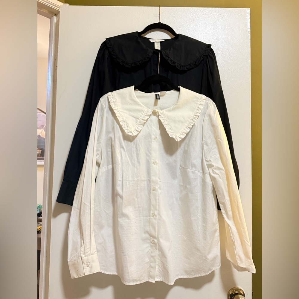 Pair of black and white button up statement collar blouses Large